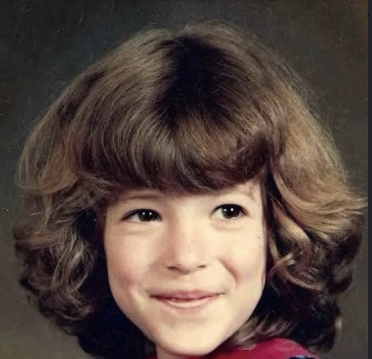 Family archive photo: childhood school portrait of Rebecca