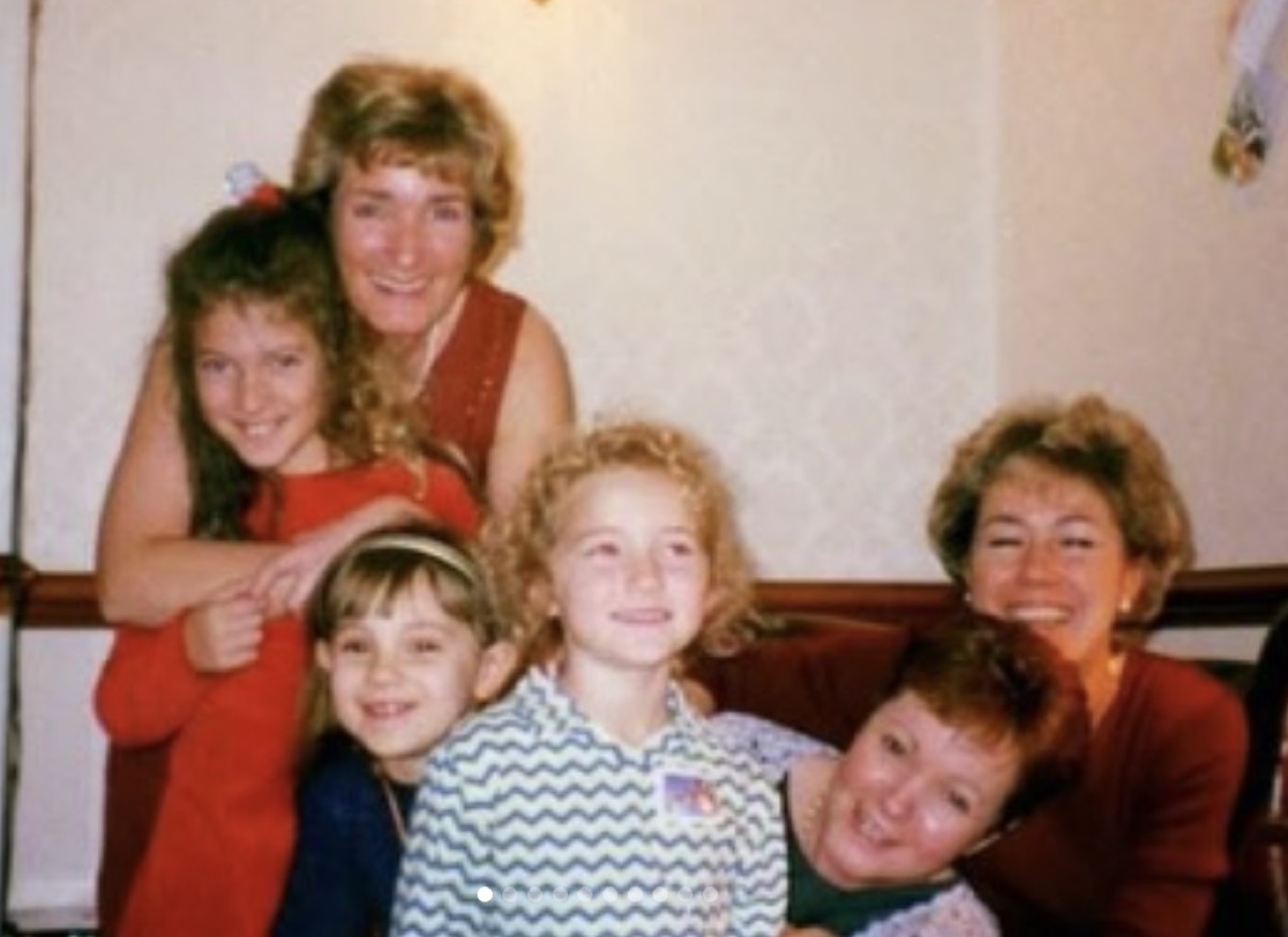 Family archive photo: a smiling multi-generational family gathering