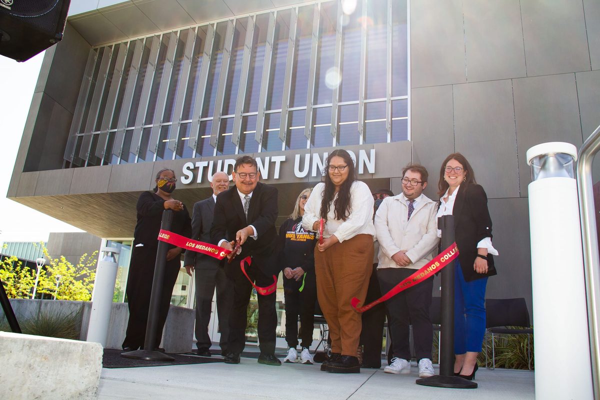 Officials cut the ribbon at the opening of the new Los Medanos College Student Union