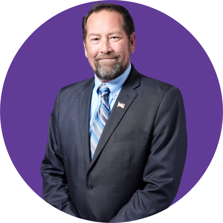 Supervisor Ken Carlson in a purple circle badge