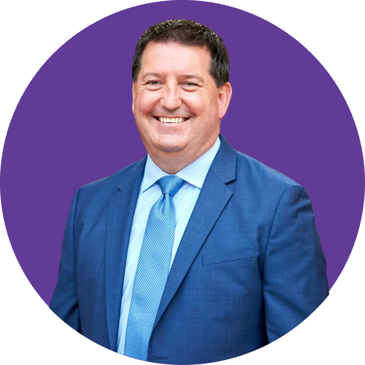 State Senator Tim Grayson in a purple circle badge