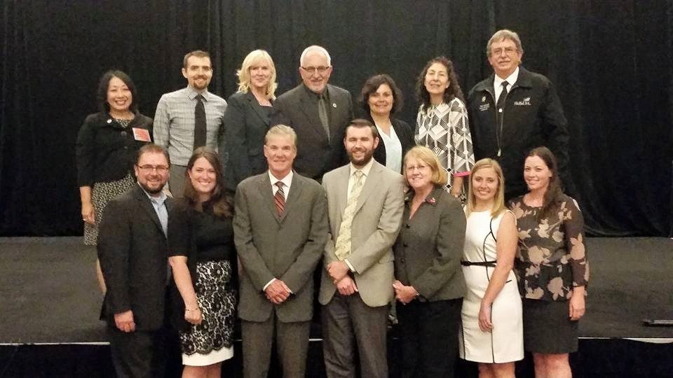 Rebecca with California Department of Education colleagues at a formal event